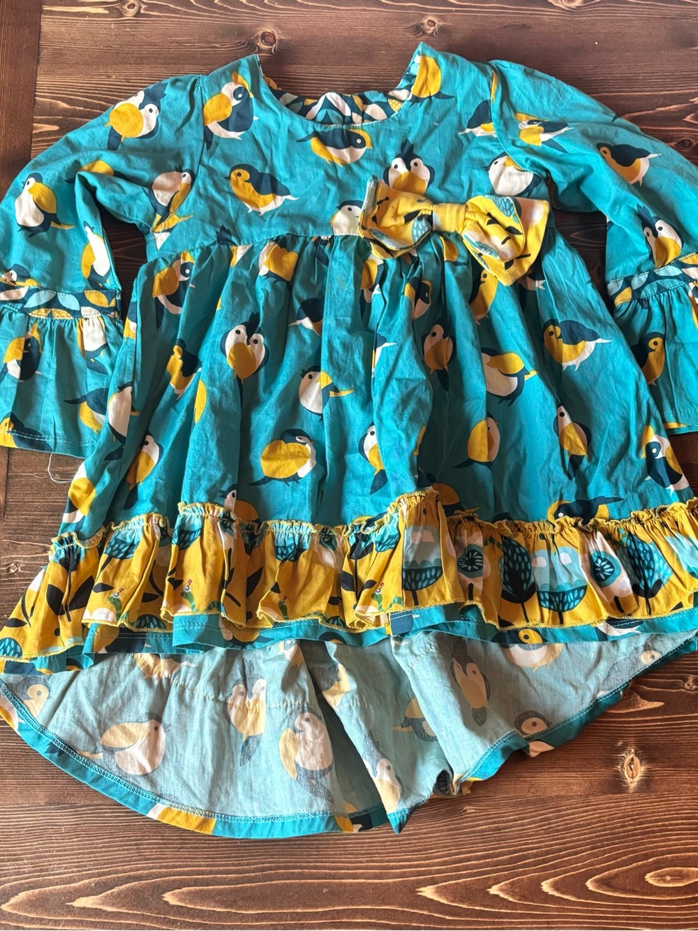Jelly The Pug Teal Dress with Yellow and White Bird Motif